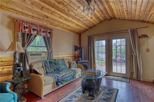 sitting room with dark hardwood / wood-style flooring, wood ceiling, and vaulted ceiling