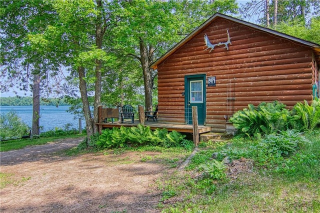 view of side of property with a water view