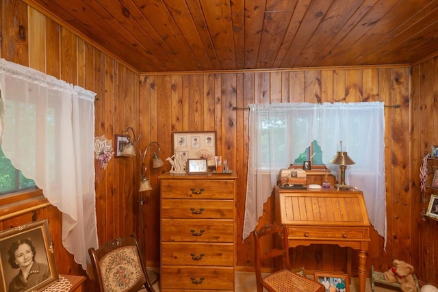 bedroom with wooden walls and wooden ceiling