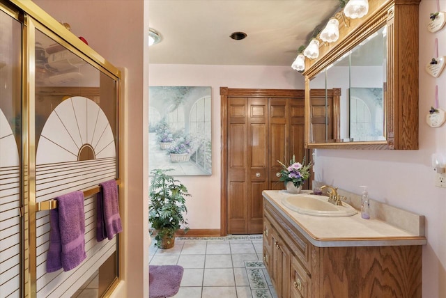 bathroom with tile floors and large vanity