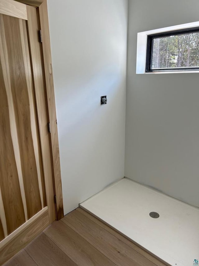 bathroom featuring hardwood / wood-style flooring