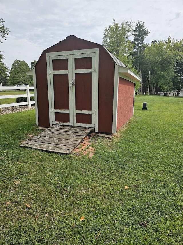 view of outdoor structure with a yard