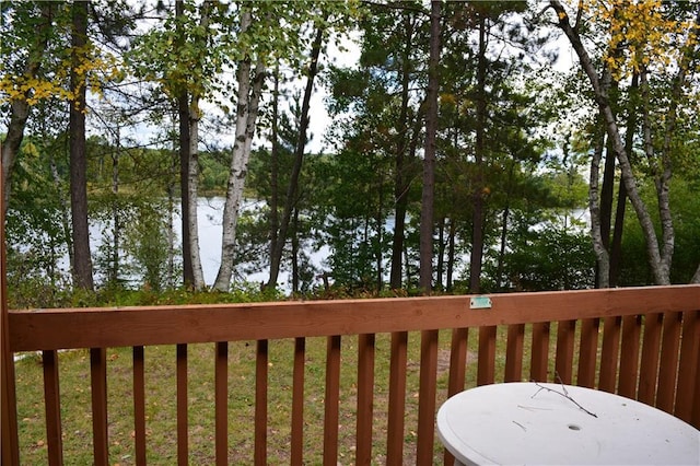 deck featuring a water view