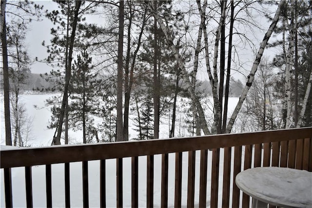 view of snow covered deck