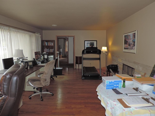 office space with dark hardwood / wood-style flooring