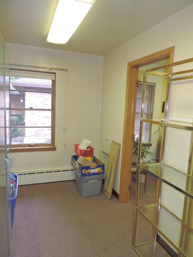 game room featuring carpet and a baseboard radiator