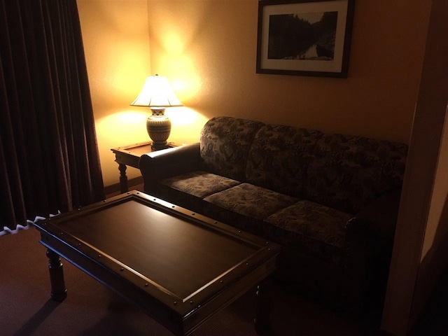 living room featuring carpet floors and pool table