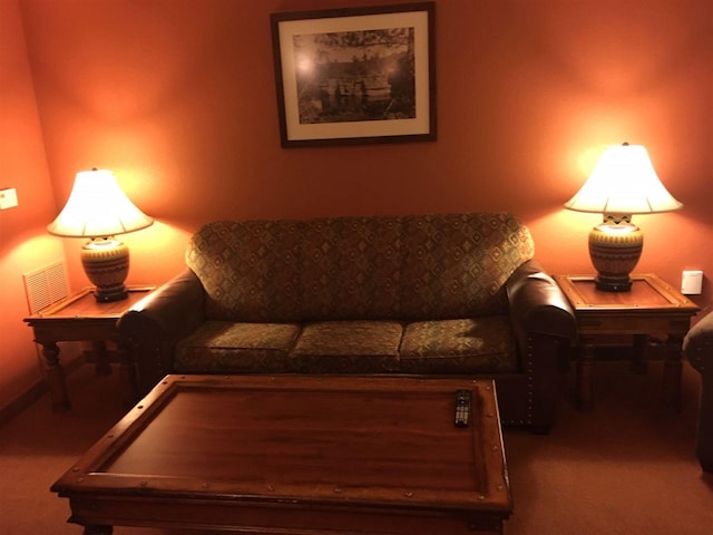 carpeted living room with pool table