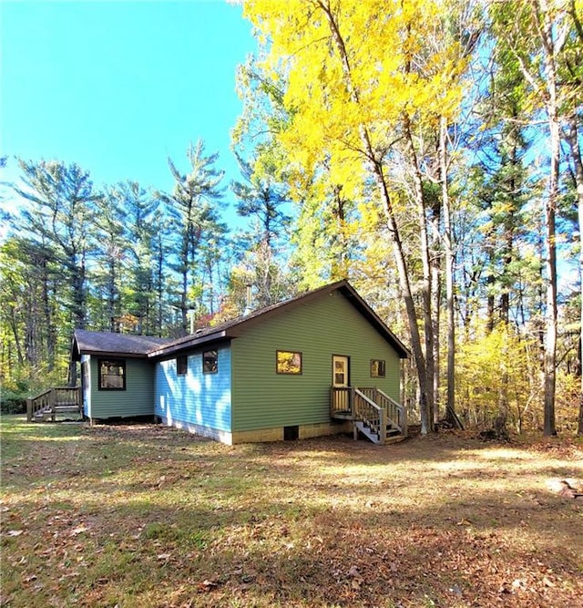 exterior space with a yard