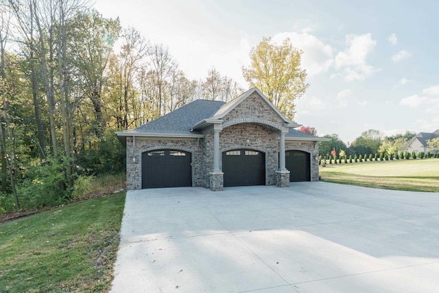 garage featuring a yard