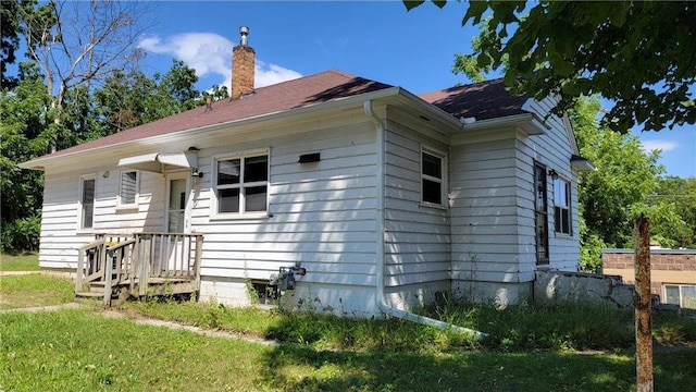 exterior space with a front yard