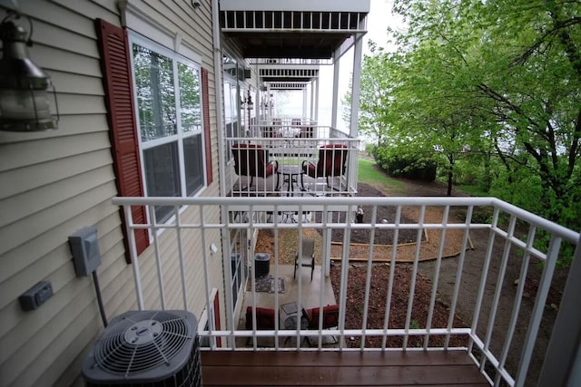 balcony featuring central AC unit