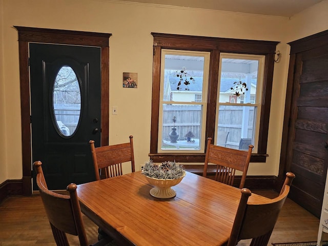 dining room with hardwood / wood-style floors