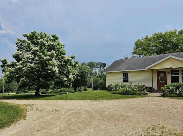 view of property exterior featuring a yard