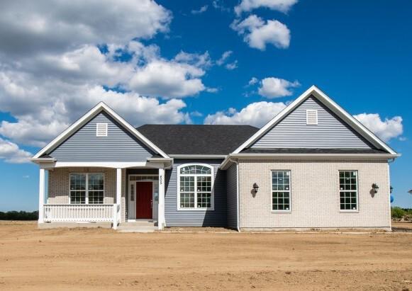 ranch-style home featuring covered porch