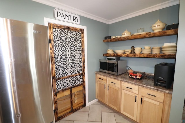 kitchen with light tile flooring, light brown cabinetry, ornamental molding, and appliances with stainless steel finishes