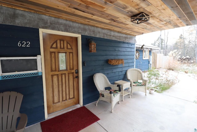 view of exterior entry with radiator heating unit