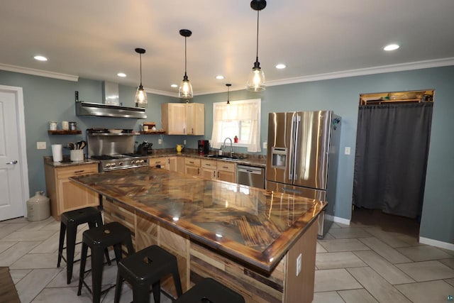 kitchen with a center island, light tile floors, wall chimney range hood, appliances with stainless steel finishes, and sink