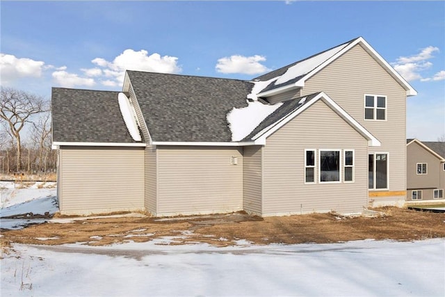 view of snow covered property