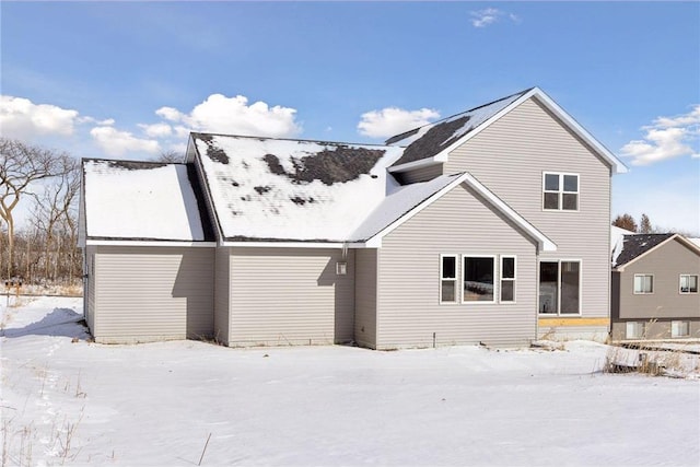 view of snow covered property