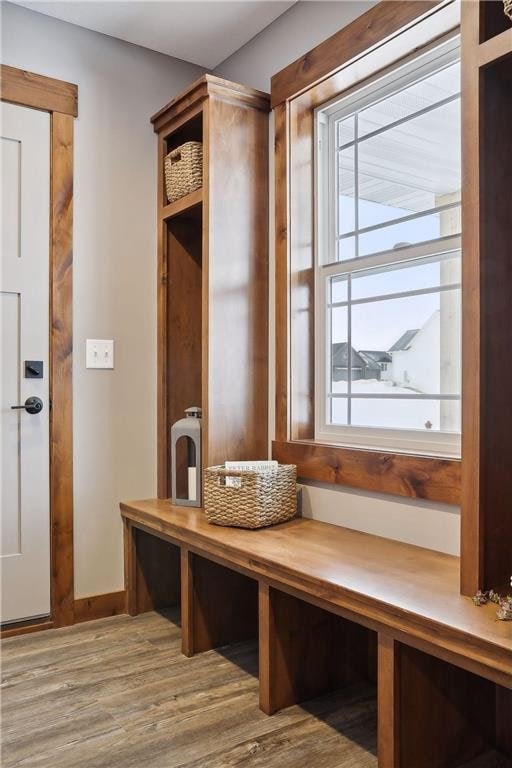 mudroom with light hardwood / wood-style flooring