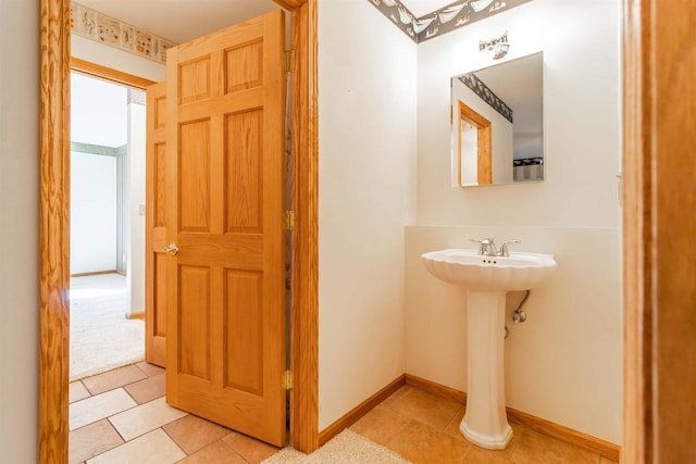 bathroom with tile floors