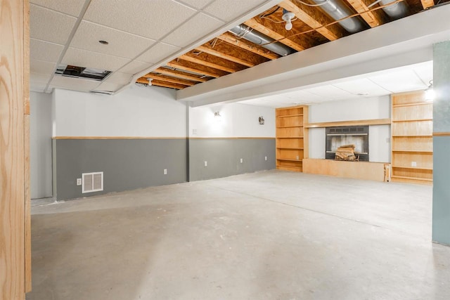 basement featuring a fireplace