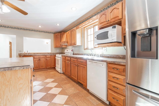 kitchen with premium range hood, light tile floors, ceiling fan, white appliances, and sink