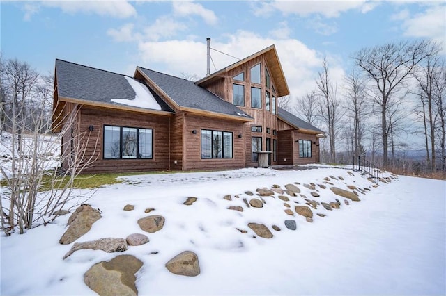 view of snow covered property