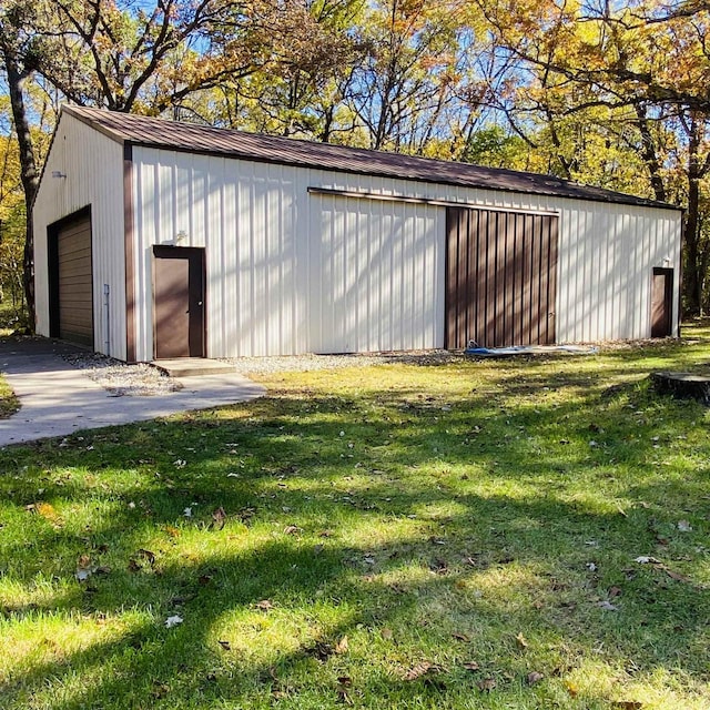 garage with a yard