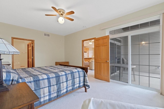 carpeted bedroom with access to exterior, connected bathroom, and ceiling fan