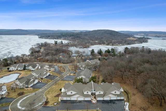 drone / aerial view with a water view