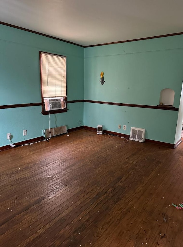 unfurnished room featuring dark hardwood / wood-style floors