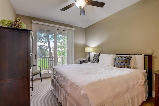 bedroom featuring access to outside, ceiling fan, and vaulted ceiling