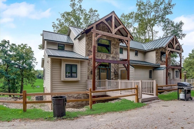 view of front of property with a deck