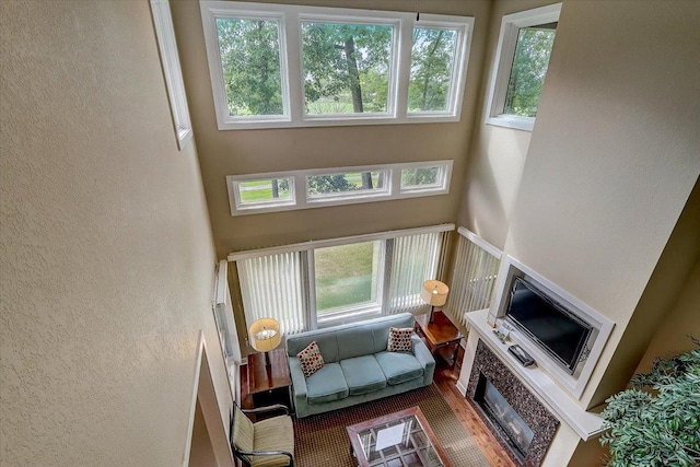 living room with a towering ceiling