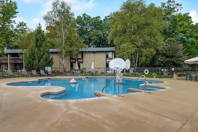 view of pool with a patio