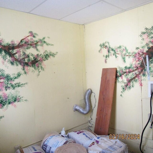 bedroom with a drop ceiling