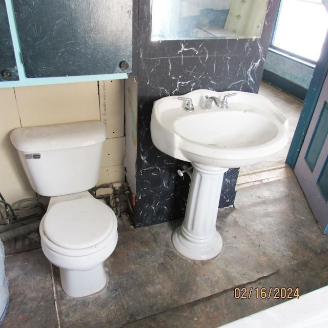 bathroom featuring toilet