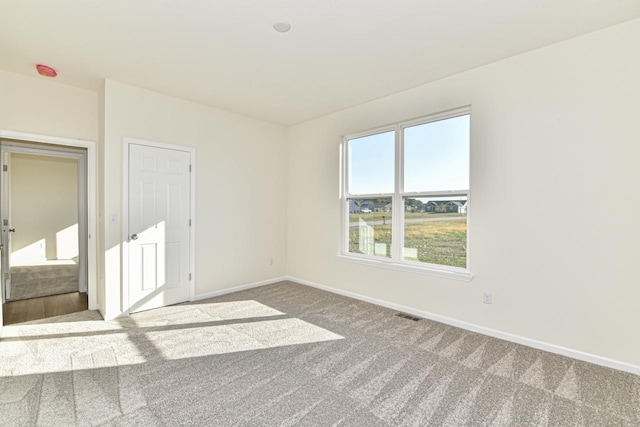 view of carpeted spare room