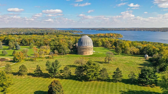 aerial view with a rural view and a water view