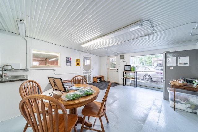 dining space with sink