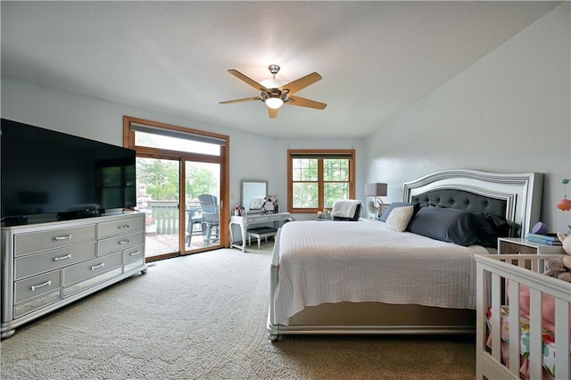 carpeted bedroom featuring ceiling fan and access to outside