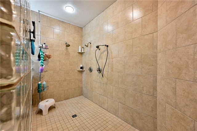 bathroom featuring tile walls and tiled shower