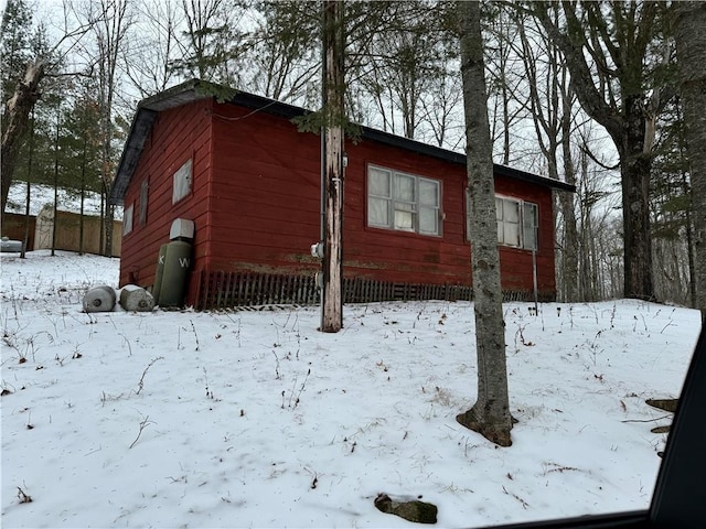 view of snow covered property