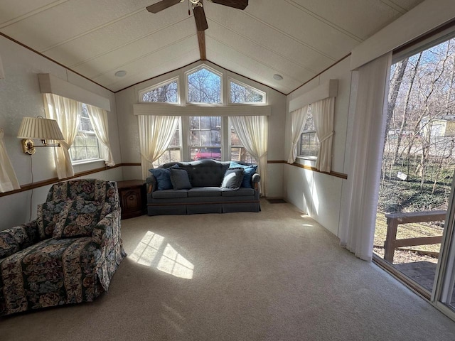 sunroom / solarium featuring ceiling fan and lofted ceiling