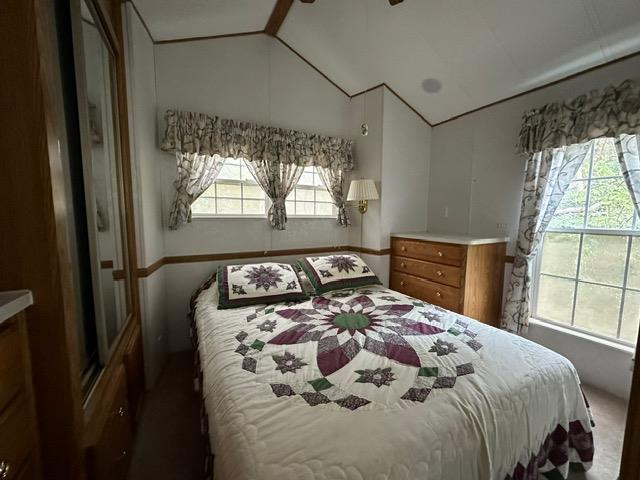 bedroom with vaulted ceiling