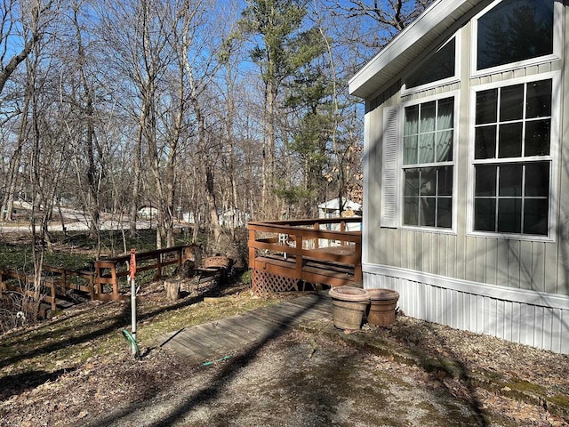 147 Vacation Blvd, Edgerton, WI 53534 - view of property exterior featuring a deck