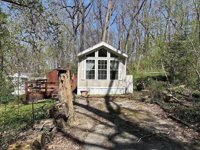 147 Vacation Blvd, Edgerton, WI 53534 - view of side of property featuring a wooden deck