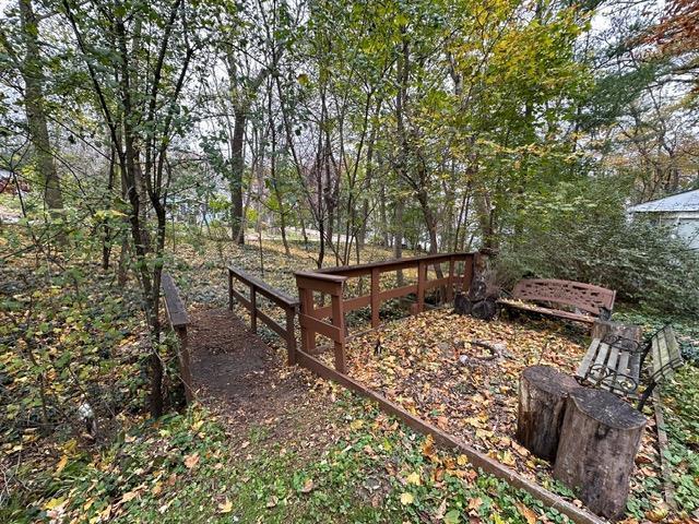 view of yard featuring a wooden deck